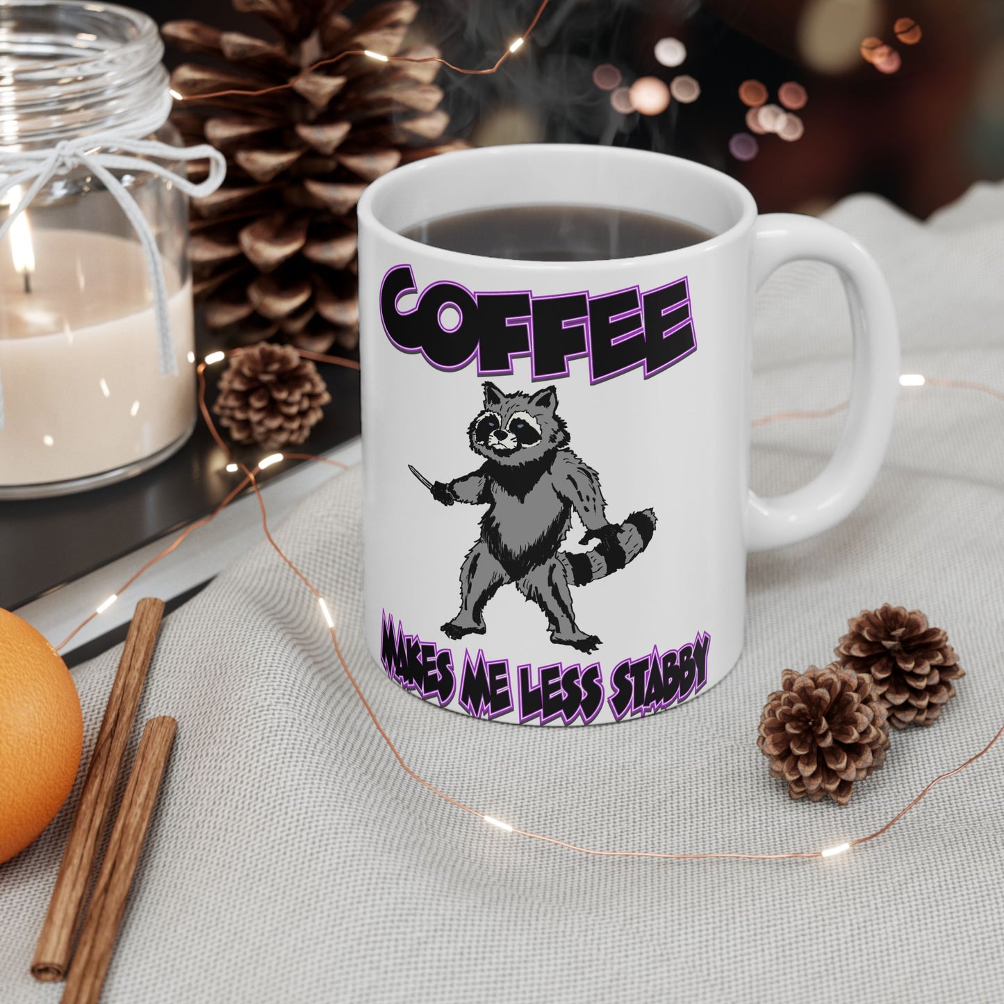 Funny Ceramic Mug - 'Coffee Makes Me Less Stabby' with Playful Racoon Design